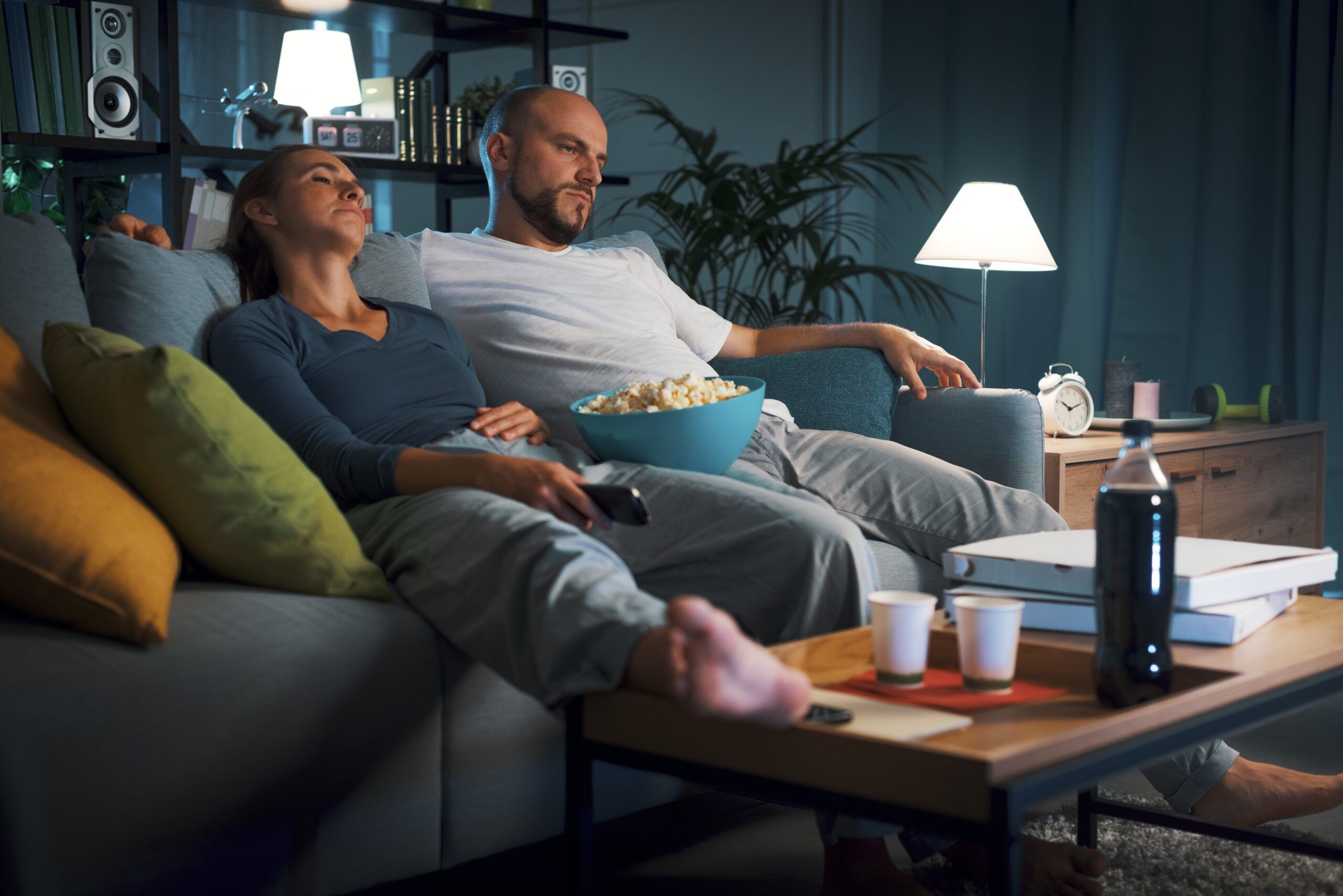 A couple watching TV on one boring Tuesday night.
