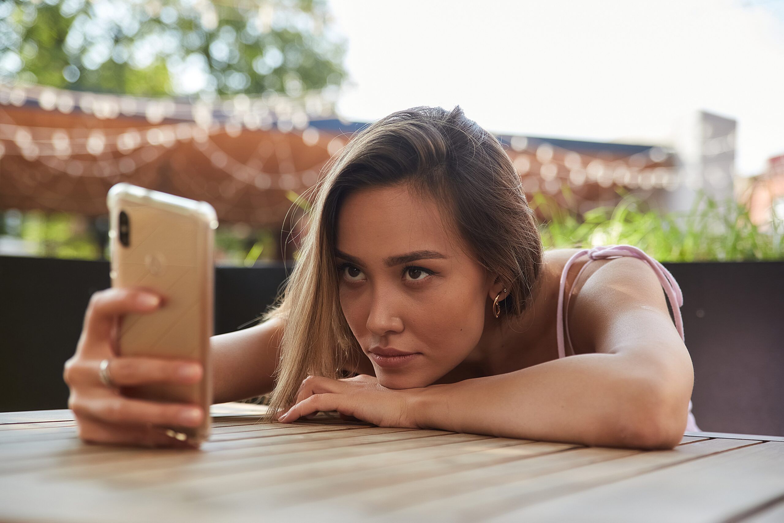 A Millennial woman suffering from anticipatory loss.