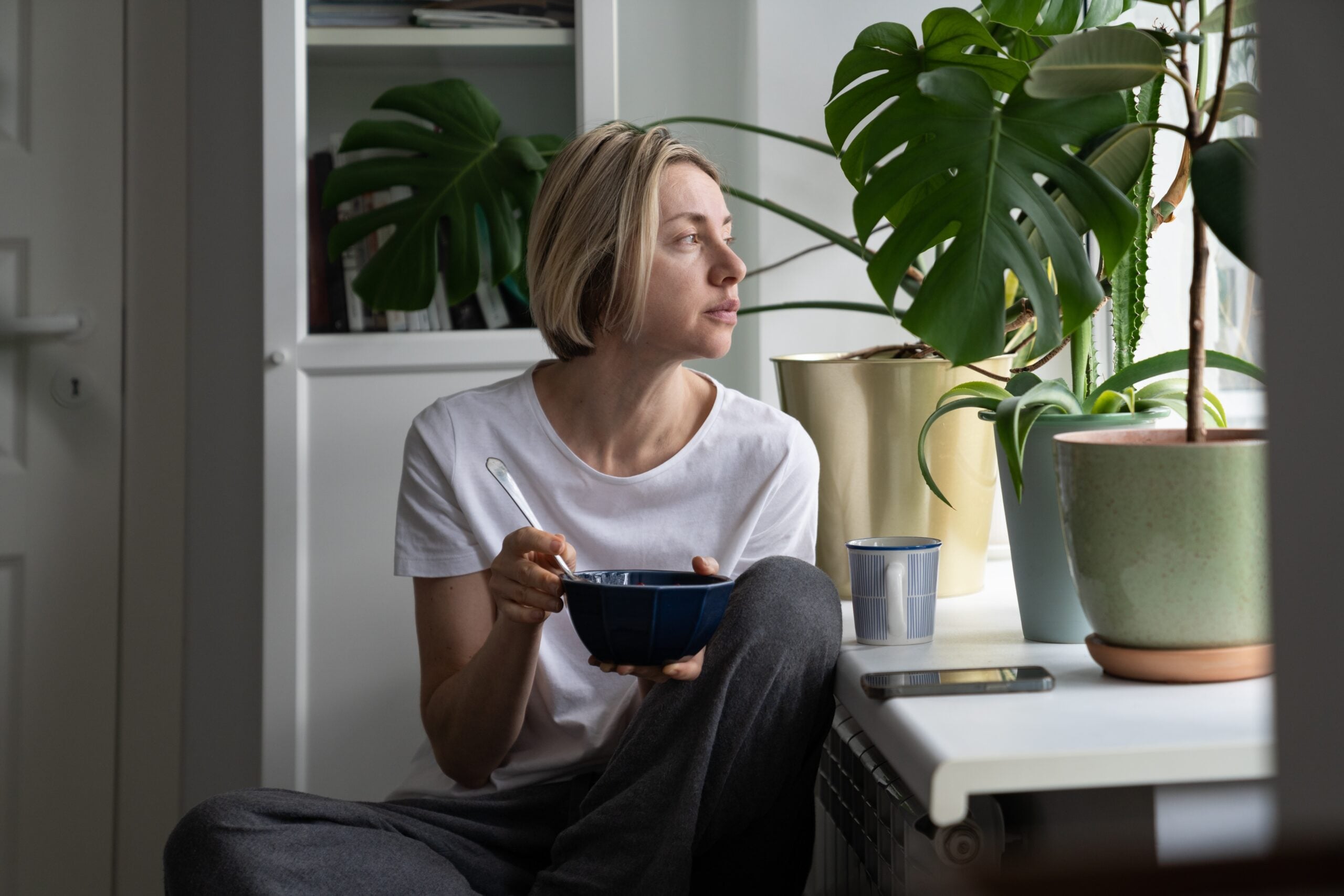 A midlife woman feeling the grief that comes from drifting friendships.