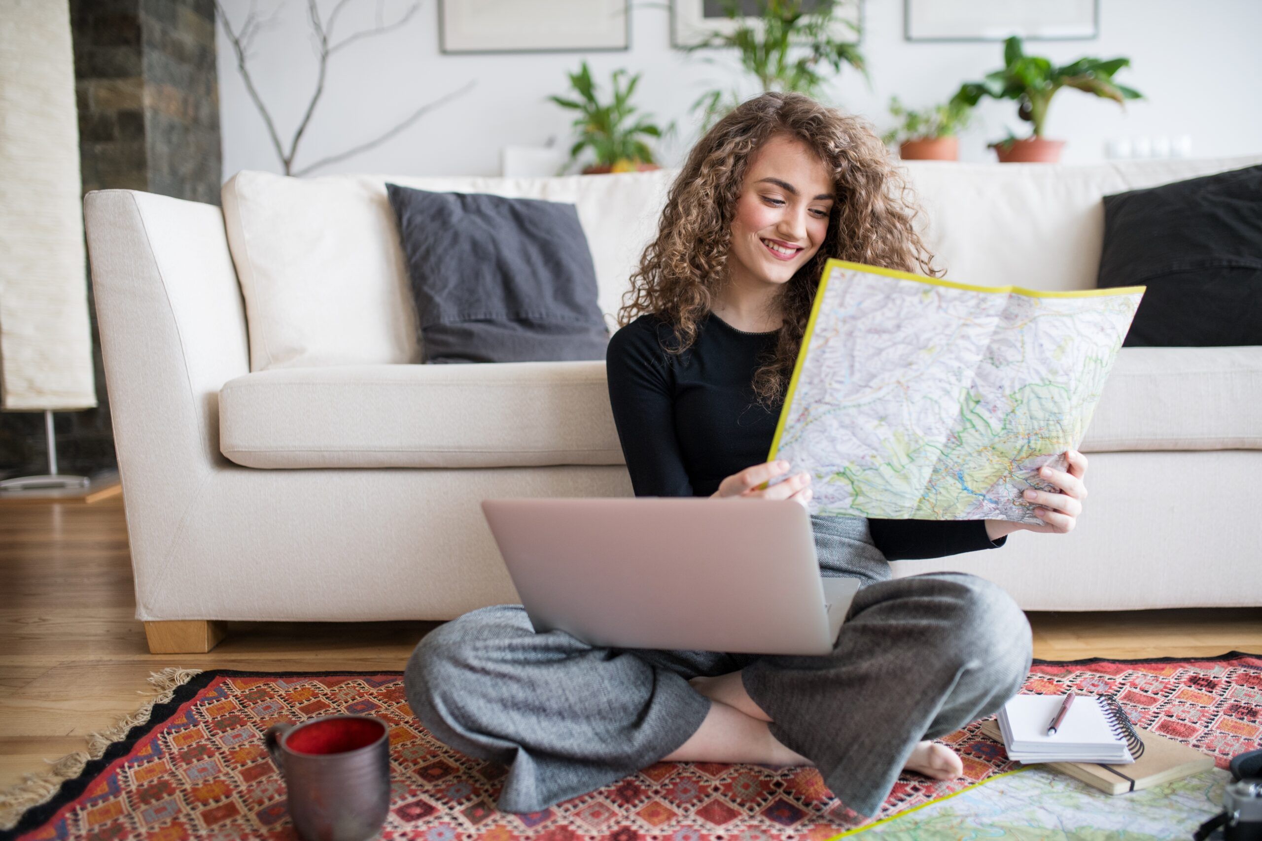 A woman planning her next vacation.