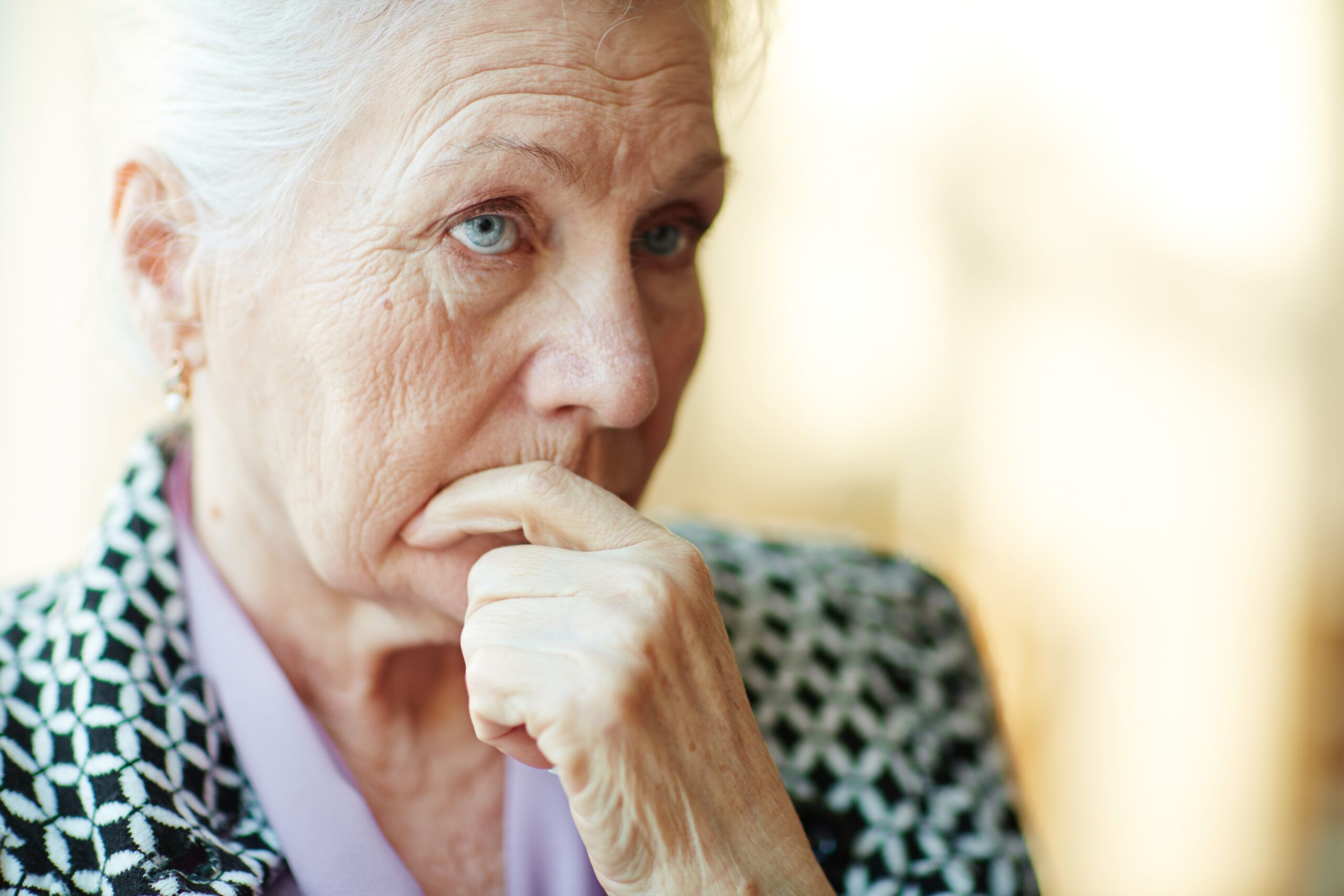 A woman in her 70s who's stopped pushing her kids to visit.