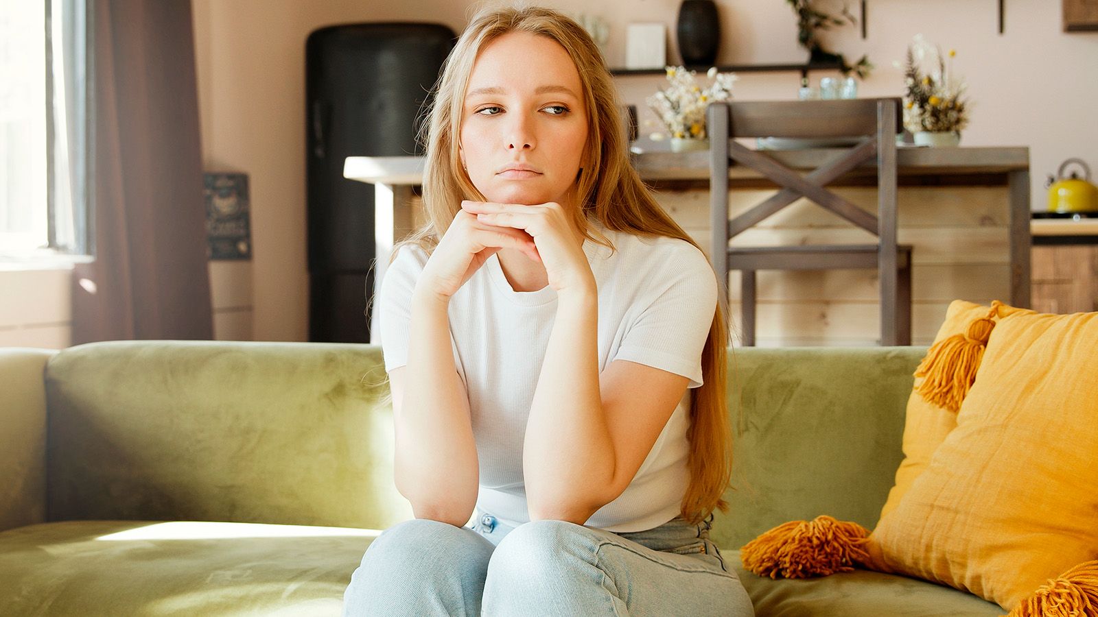 Young woman contemplating her love lift, looking sad.