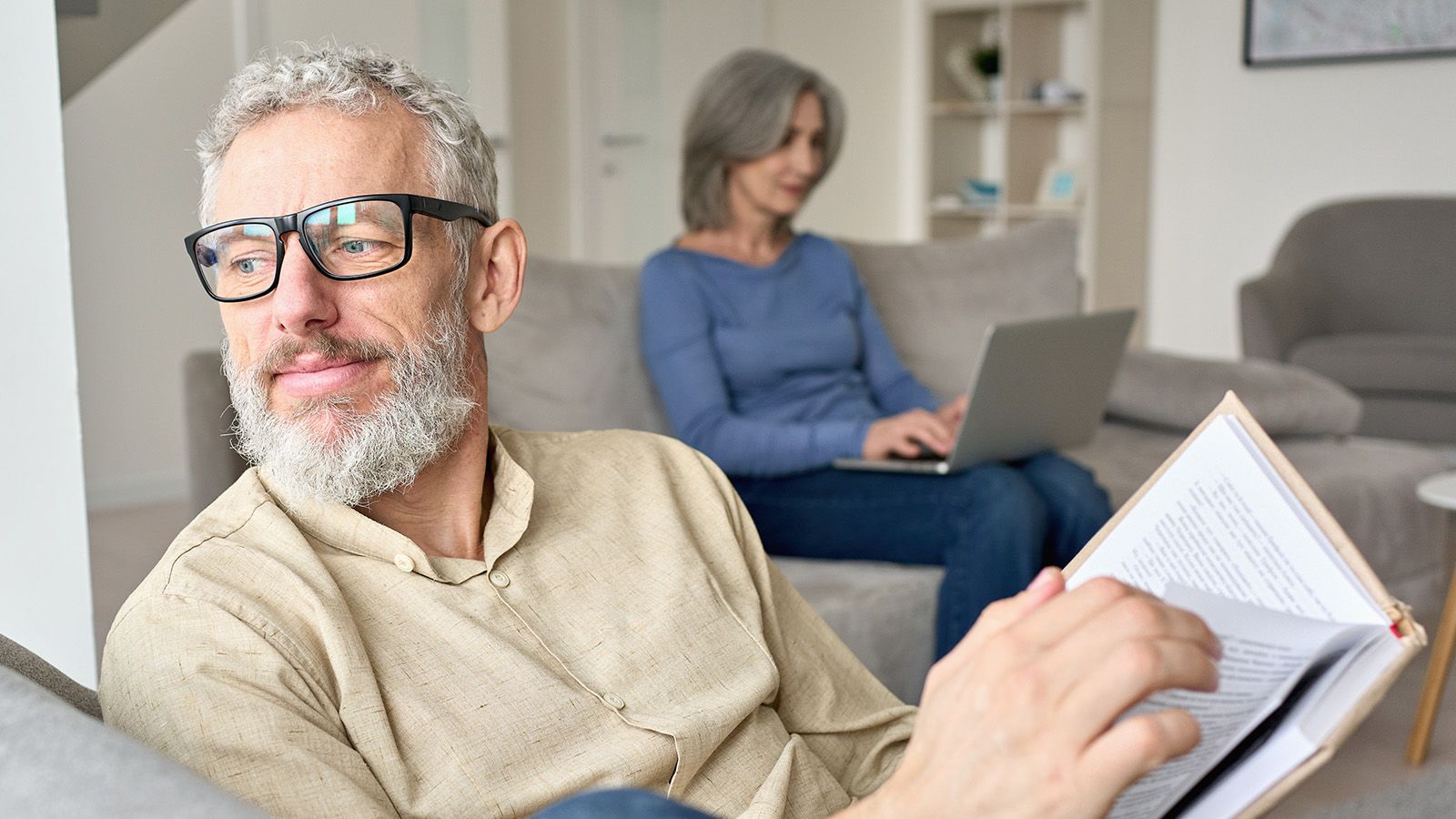Retired couple on the couch.