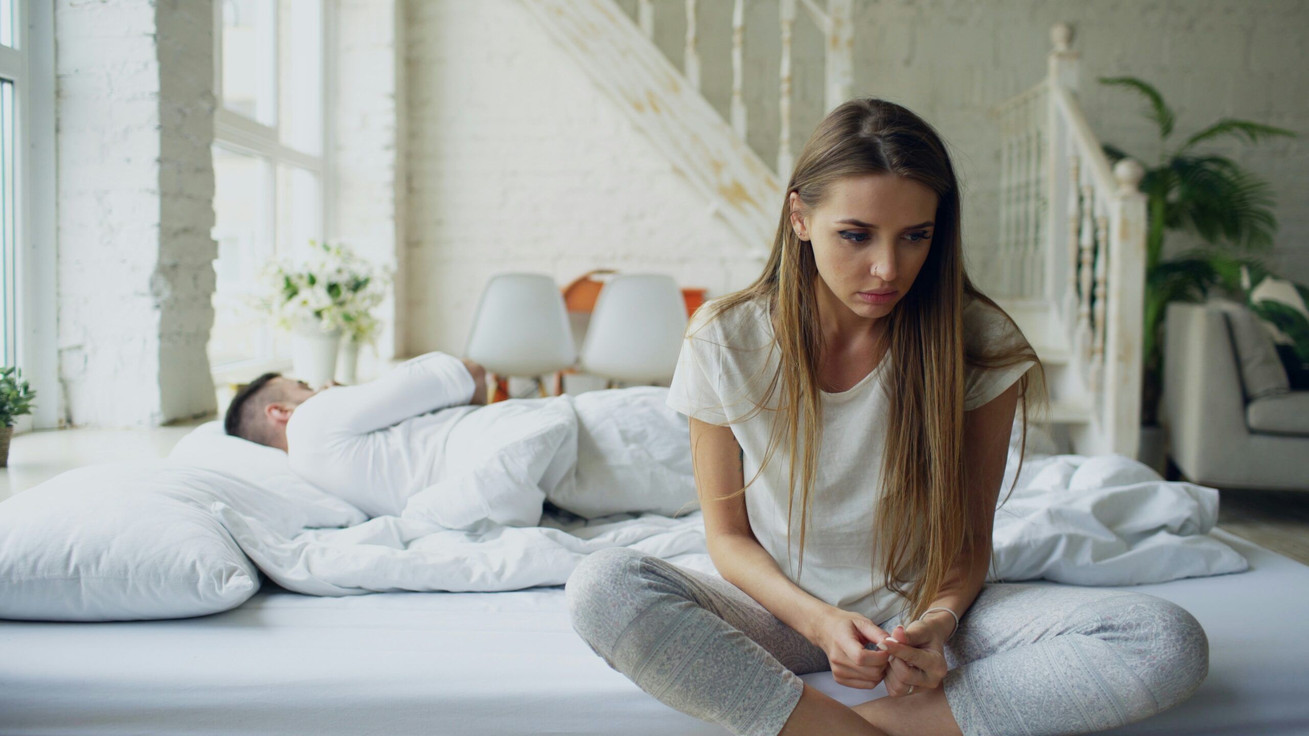 A woman who mistakes anxiety for chemistry in her relationships.