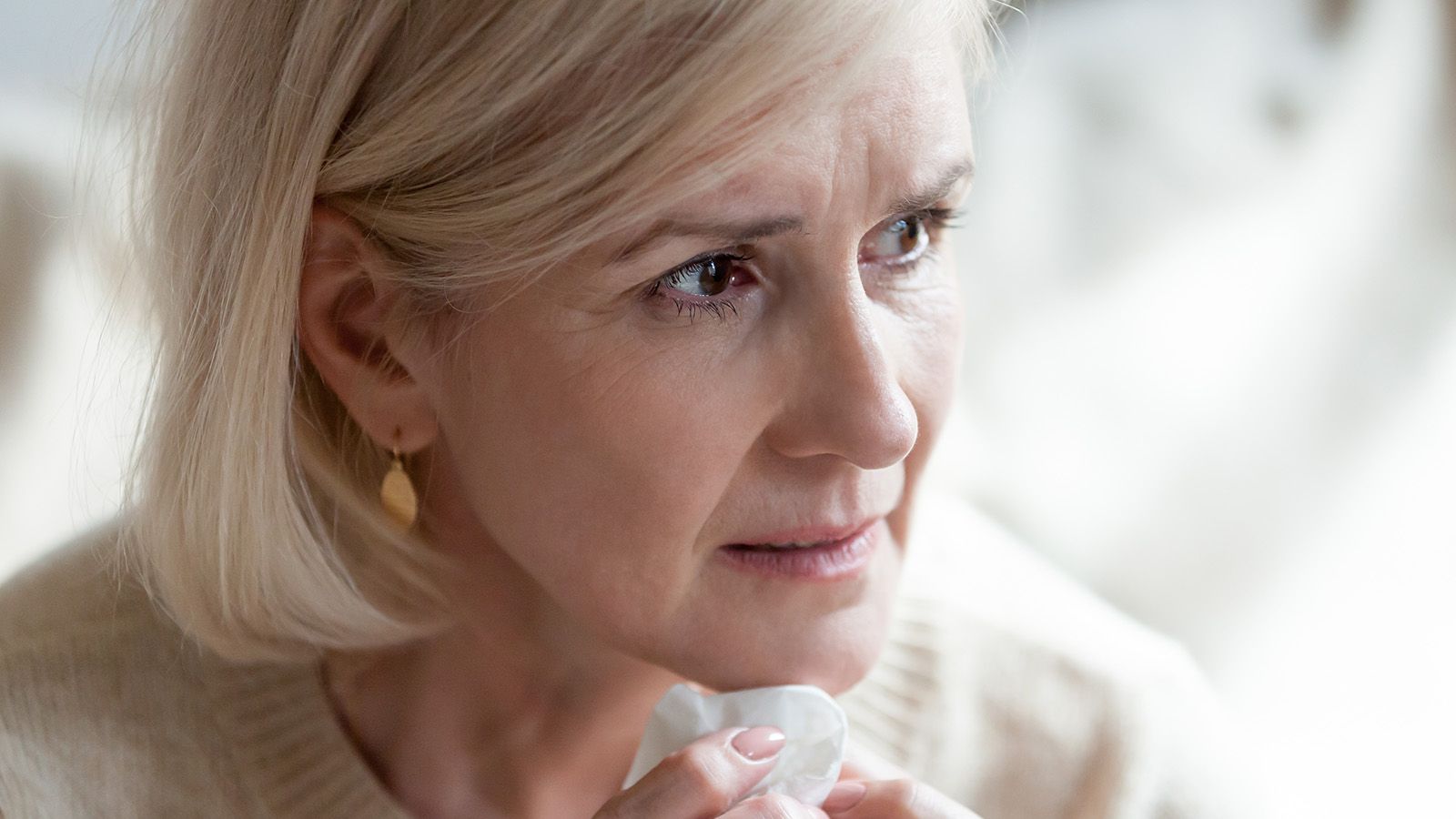 Sad frustrated mature old woman in tears feeling blue thinking of loneliness sorrow grief, upset thoughtful middle aged woman crying worried about problems, depressed senior widow mourning grieving