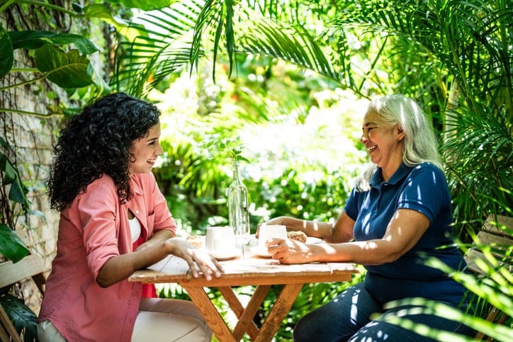 adult woman and mother having dinner