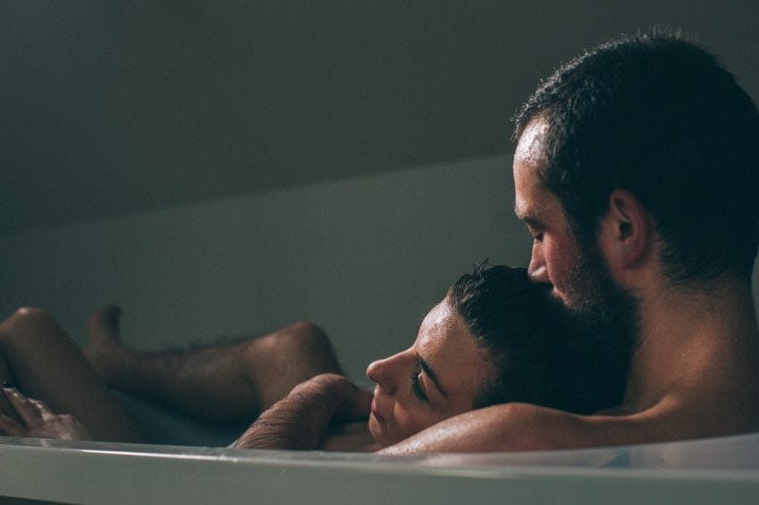 Couple bathing together