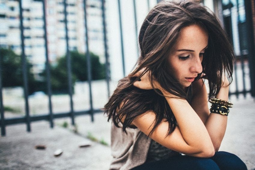 woman looking distraught