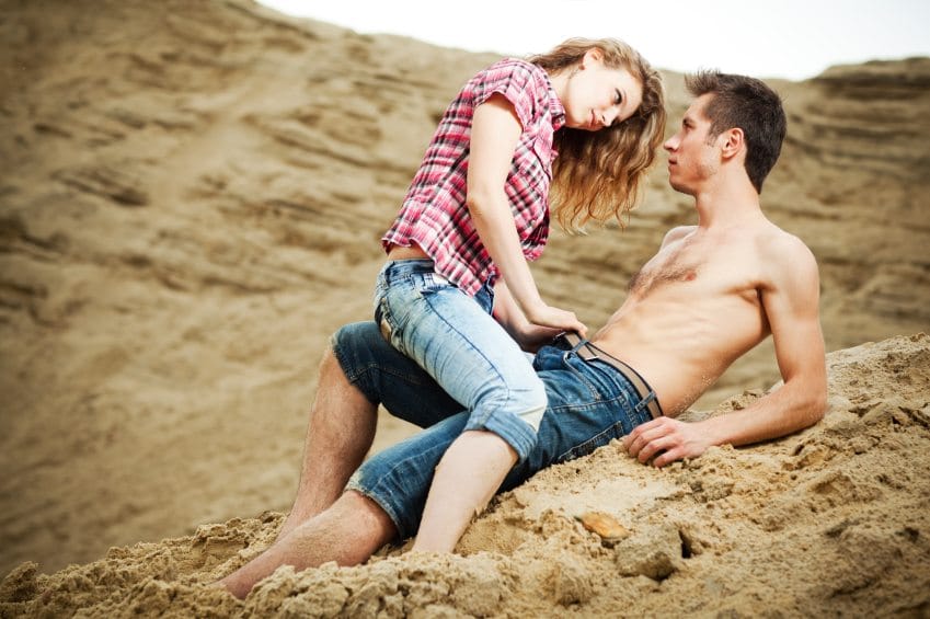 Couple being romantic on beach