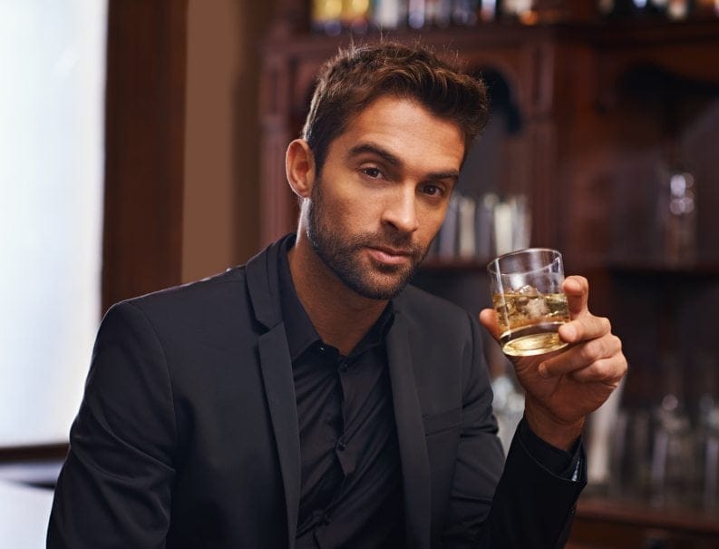 Hansome young man with whiskey