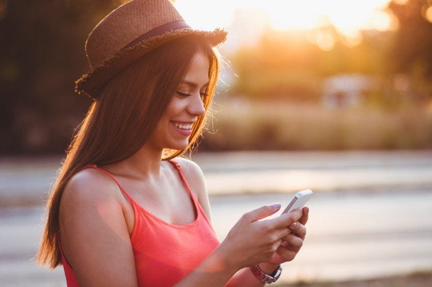 Beautiful girl with smartphone