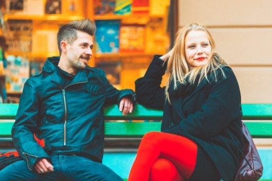 couple fearful and unhappy on a bench