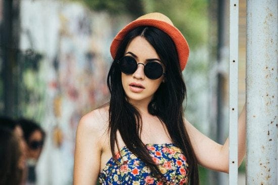 woman in sunglasses and hat