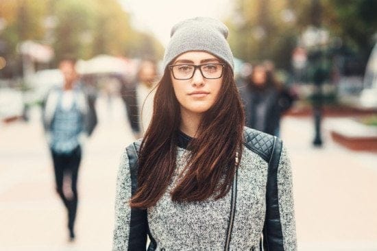 portrait of serious woman in glasses