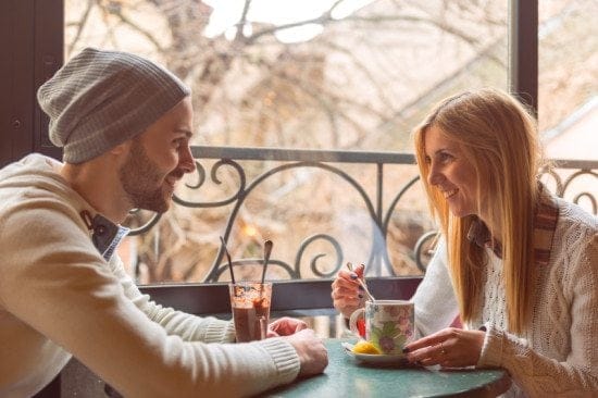 couple having breakfast at cafe