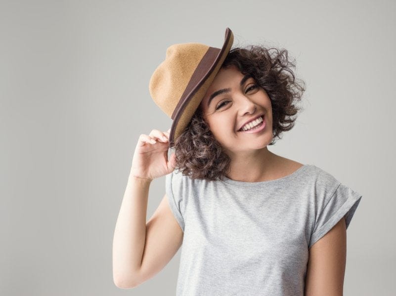 happy girl smiling hat