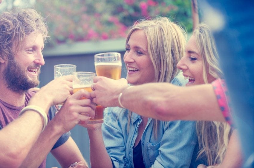 friends drinking bar summer