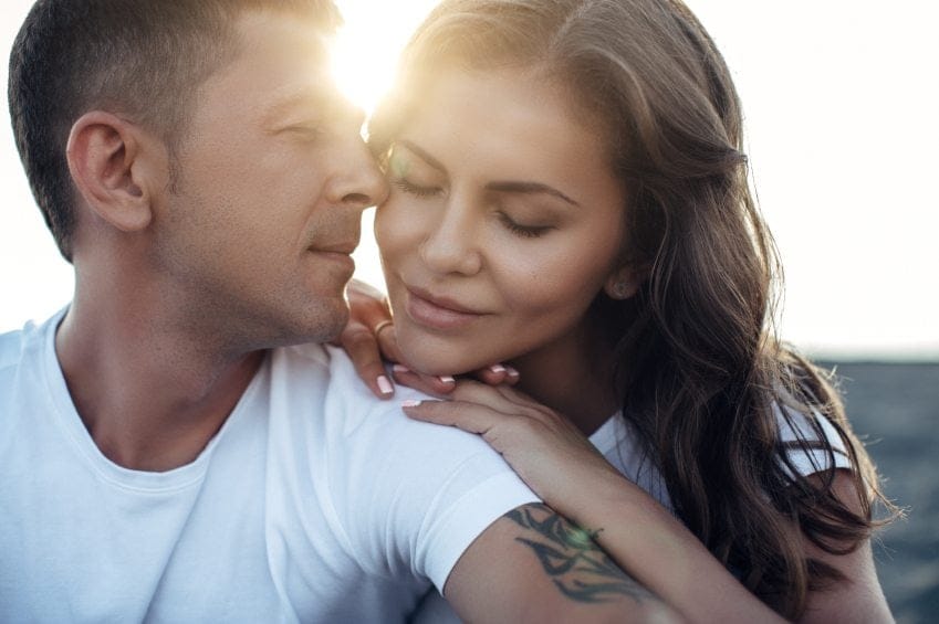 couple close sunset