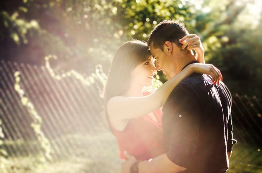 Beautiful embraced couple in the park