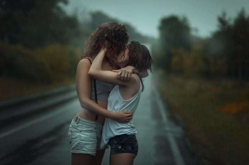 women kissing street lesbian