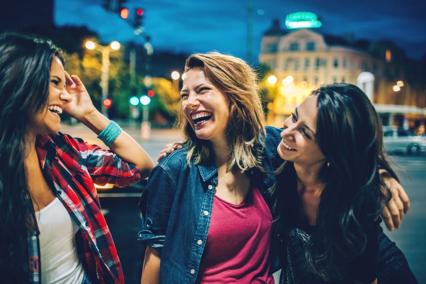 Smiling young women outdoors