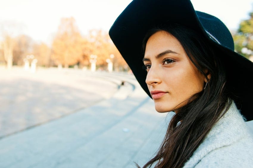 Picture of a very attractive young woman looking away