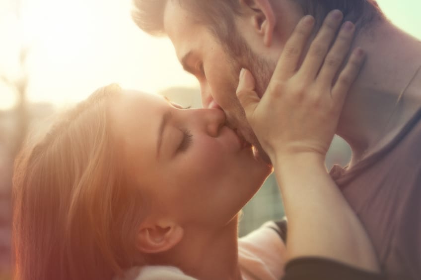 kissing couple outside