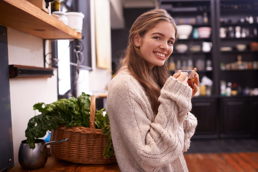 Young woman brunette smiling in coffee shop