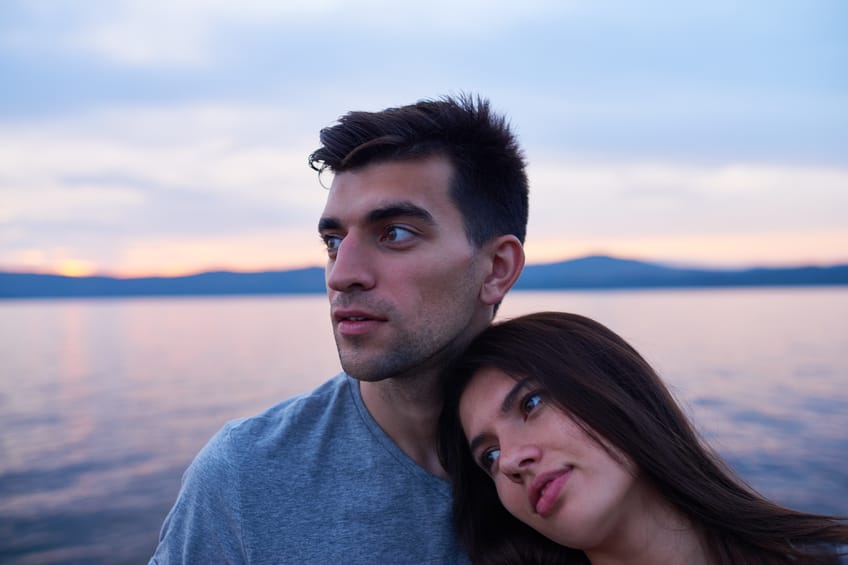 Beautiful couple contemplating nature around