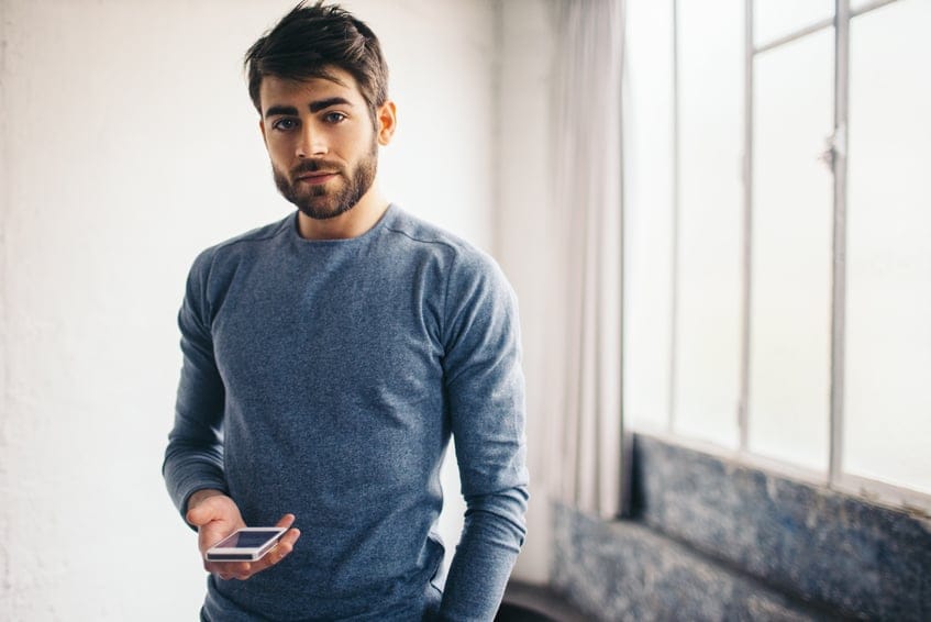 Young man with mobile phone