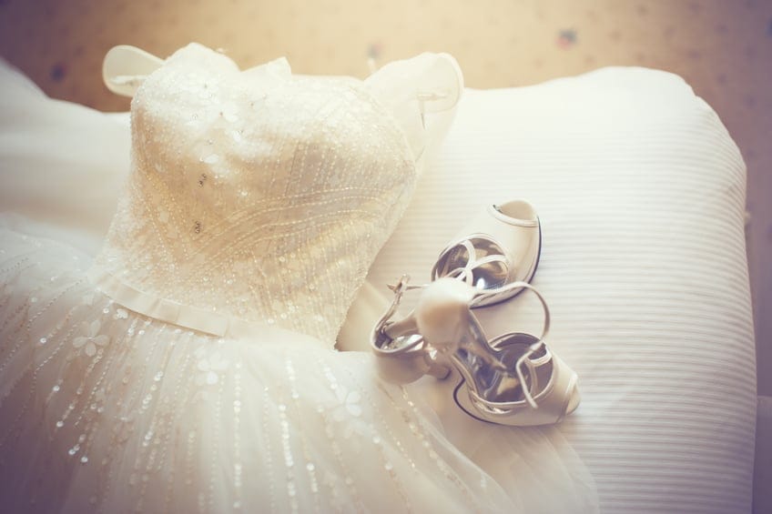 A brides wedding dress and shoes, pre-wedding