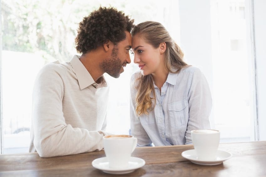 Happy couple on a date at the coffee shop