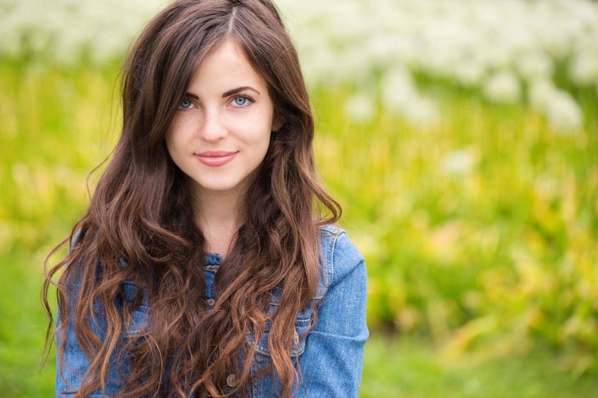 beautiful woman portrait outdoors grass green