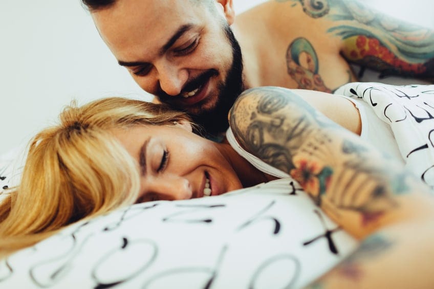 Tattooed Couple Waking Up.