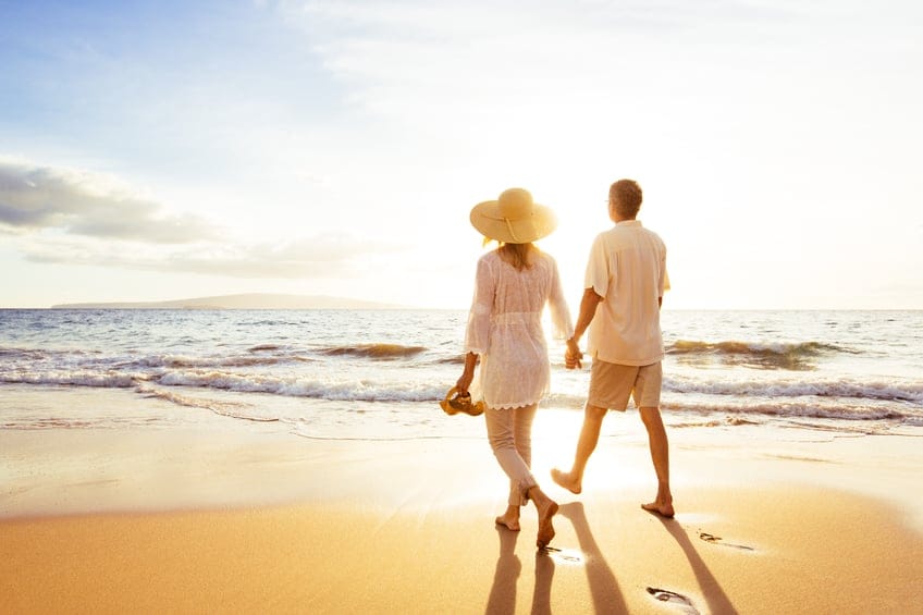 Couple walking on the beach