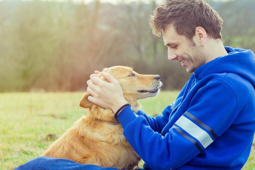 guy dog happy outdoors