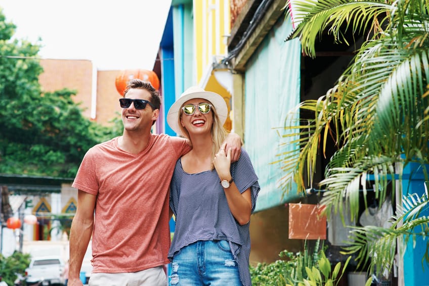 Young couple strolling on vacation