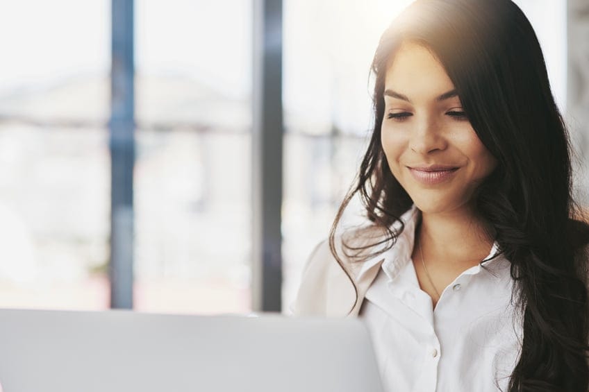 Young woman sat laptop