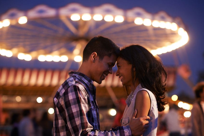 couple carnival night happy romance