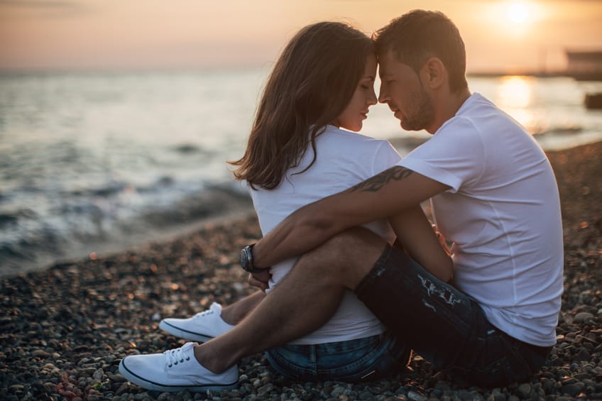 Two people embracing each other