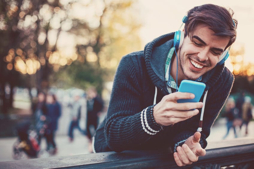 young guy texting