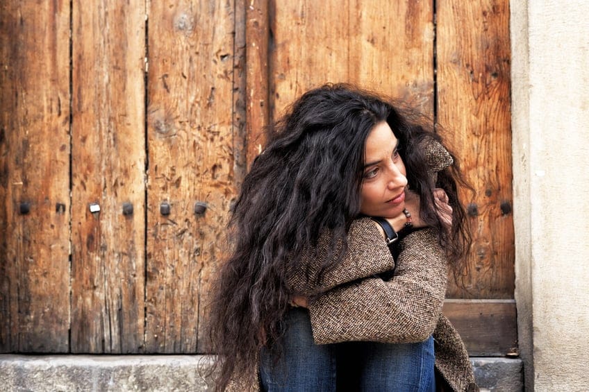 pensive woman portrait outdoors