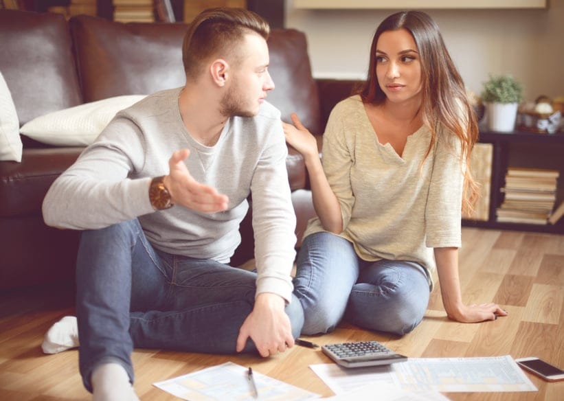 Young beautiful couple in home interior