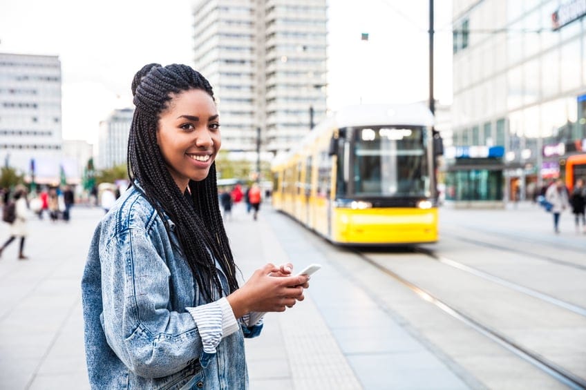 woman train city commuter portrait