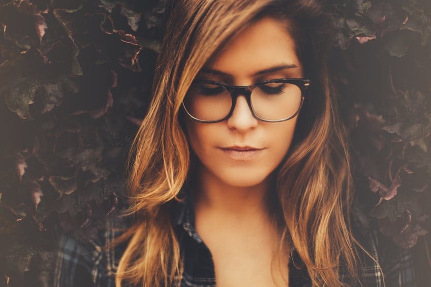 Portrait of beautiful young woman in nature