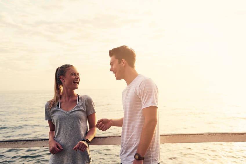 couple chat beach outdoors sunset