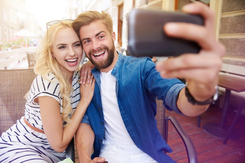 couple selfie outside vacation