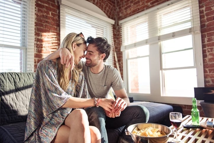 Young adults in an appart, flirting