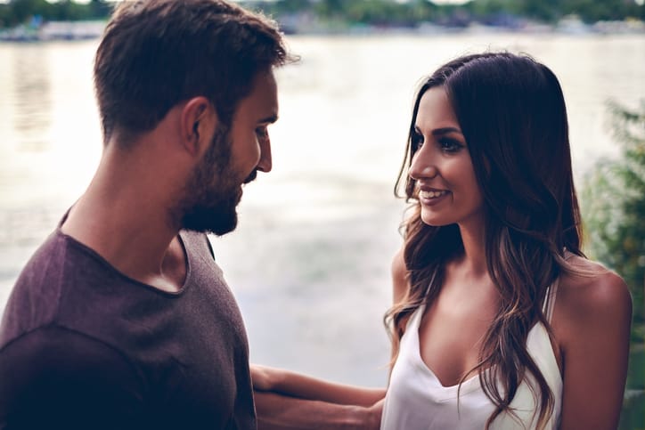 couple talking romance outdoors