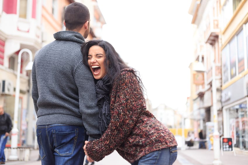 couple happy laugh romance holding hands